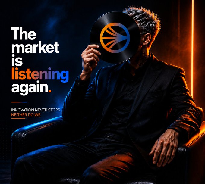The image shows a man in a dark suit seated in a leather chair, holding a vinyl record with an orange and blue logo in front of his face, accompanied by the text "The market is listening again. INNOVATION NEVER STOPS. NEITHER DO WE." The vinyl record imagery and "listening again" headline visually reinforce the post's message about the market tuning back in, with the "$S" ticker and "on repeat" reference tying to the record's playback motif.