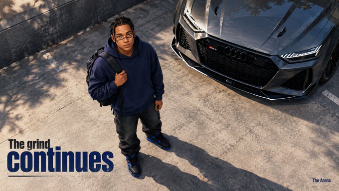 A young man with glasses wearing a navy hoodie, cargo pants, and sneakers stands next to a dark gray Audi RS6 Avant, with the text 'The grind continues' and 'The Arena' displayed.