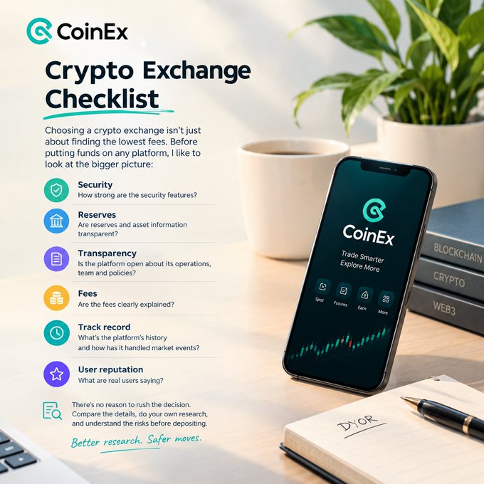 A CoinEx promotional infographic titled "Crypto Exchange Checklist" sits on a desk beside a notebook reading "DTGR," stacked blockchain/crypto/web3 books, and a smartphone displaying the CoinEx app with the tagline "Trade Smarter, Explore More," visually reinforcing the message that traders should evaluate security, reserves, transparency, fees, track record, and user reputation before depositing funds.