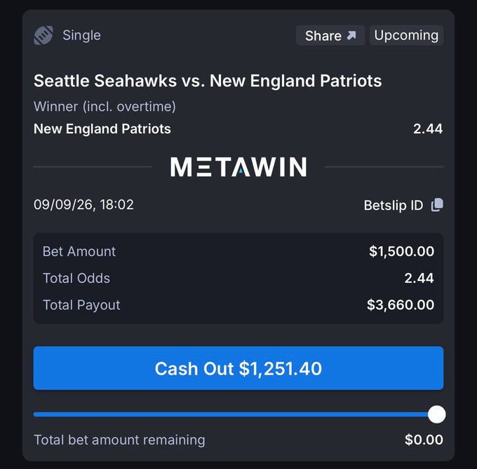 A MetaWin betting slip shows a $1,500 single wager on the New England Patriots to win (including overtime) against the Seattle Seahawks at 2.44 odds for a total payout of $3,660.00, placed on 09/09/26 at 18:02, with a cash-out option of $1,251.40 available, illustrating the user's promotion of MetaWin's superior odds and $1M airdrop for placing bets through the platform.
