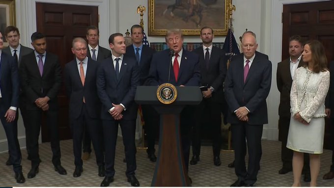 President Donald Trump speaks at a podium during an event at the White House on Tuesday, Jan. 14, 2020. Trump delivers remarks on developing the United States financial infrastructure with digital assets. The accompanying post refers to Trump's speech as a significant move in constructing a national financial competition framework, emphasizing the qualitative over short-term impacts, elevating crypto regulation to a national financial infrastructure issue.