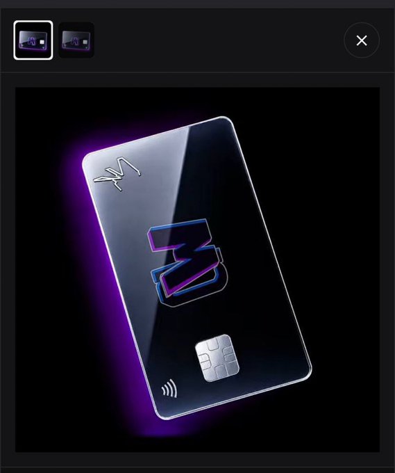 A sleek metallic NFT card with purple neon lighting, featuring the "3" logo, chip, and contactless symbol—representing the Mavanoids Genesis NFT. The card design serves as a visual collectible for holders who can mint the Mavanoids NFT for free on the Robinhood Chain launchpad.