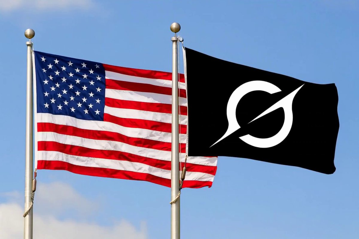 The image features two American flags, one black with a white circle on top of it and the other red and white striped flag. The text "BREAKING: The U.S. government says Grok is critical to America's national security." indicates that Grok is an important player in the country's defense strategy. The post also mentions that Grok supports mission-critical operations across Secret and Top Secret networks, which highlights its significance in ensuring the nation's security.