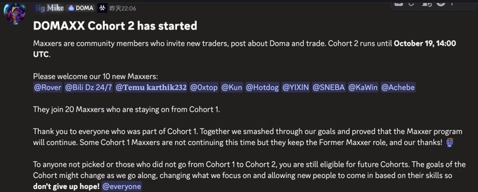 A Discord message from Big Mike announcing 'DOMAXX Cohort 2 has started', welcoming 10 new Maxxers including @Rover, @Bll, @Temu, and others, while thanking Cohort 1 participants.
