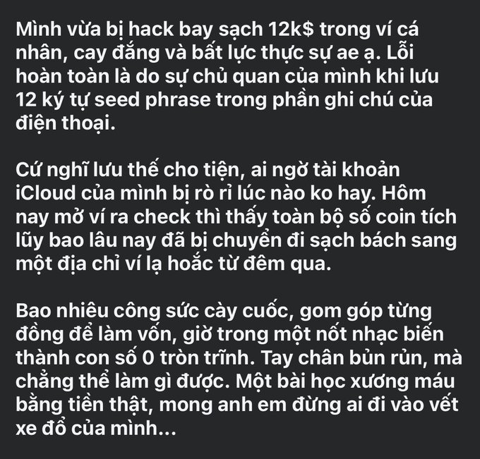 A Vietnamese text post describing a personal experience of being hacked and losing 12k$ in crypto from a wallet due to carelessly storing the seed phrase in phone notes.