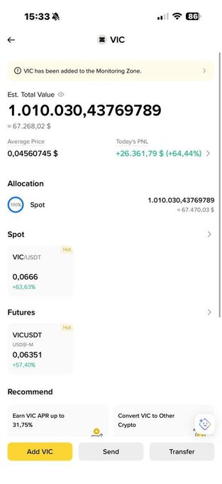 The image shows a mobile phone screen displaying information about a cryptocurrency called "VIC". The screen has a list of features, such as "still hold Spot VIC + 60% in a day if VIC copy chart", indicating that there is a potential investment opportunity in this specific currency. The phone is turned on and positioned at the top left corner, with the background color visible but not clearly discernible. The post appears to be an article or tutorial about investing in cryptocurrencies, as it provides instructions for users to join a free signals group and access information related to VIC. The main focus of the image is therefore the cryptocurrency information displayed on the phone's screen, which could guide individuals interested in investing in VIC.