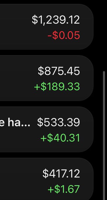 A mobile app interface showing financial figures in dollar amounts with various positive and negative changes, including $1,239.12 (-$0.05), $875.45 (+$189.33), $533.39 (+$40.31), and $417.12 (+$1.67).