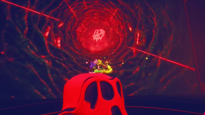 A dark, stylized 3D scene features a red skull-like structure in the foreground looking toward a glowing red tunnel containing a skull figure and green elements.