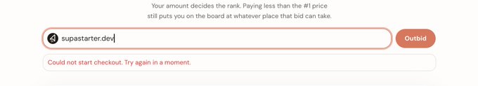 A checkout interface on outbid.lol displays the user "supastarter.dev" preparing to bid, accompanied by an error message reading "Could not start checkout. Try again in a moment," visually capturing the platform's first reported outage referenced in the caption.