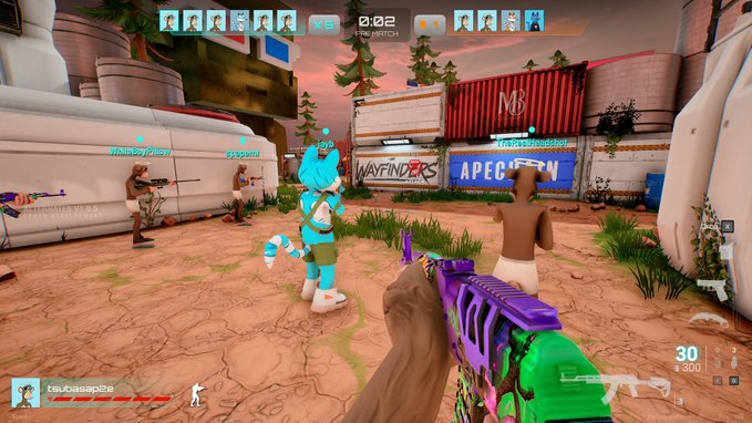 First-person view of a video game featuring a player holding a colorful purple and green gun in a multiplayer match.