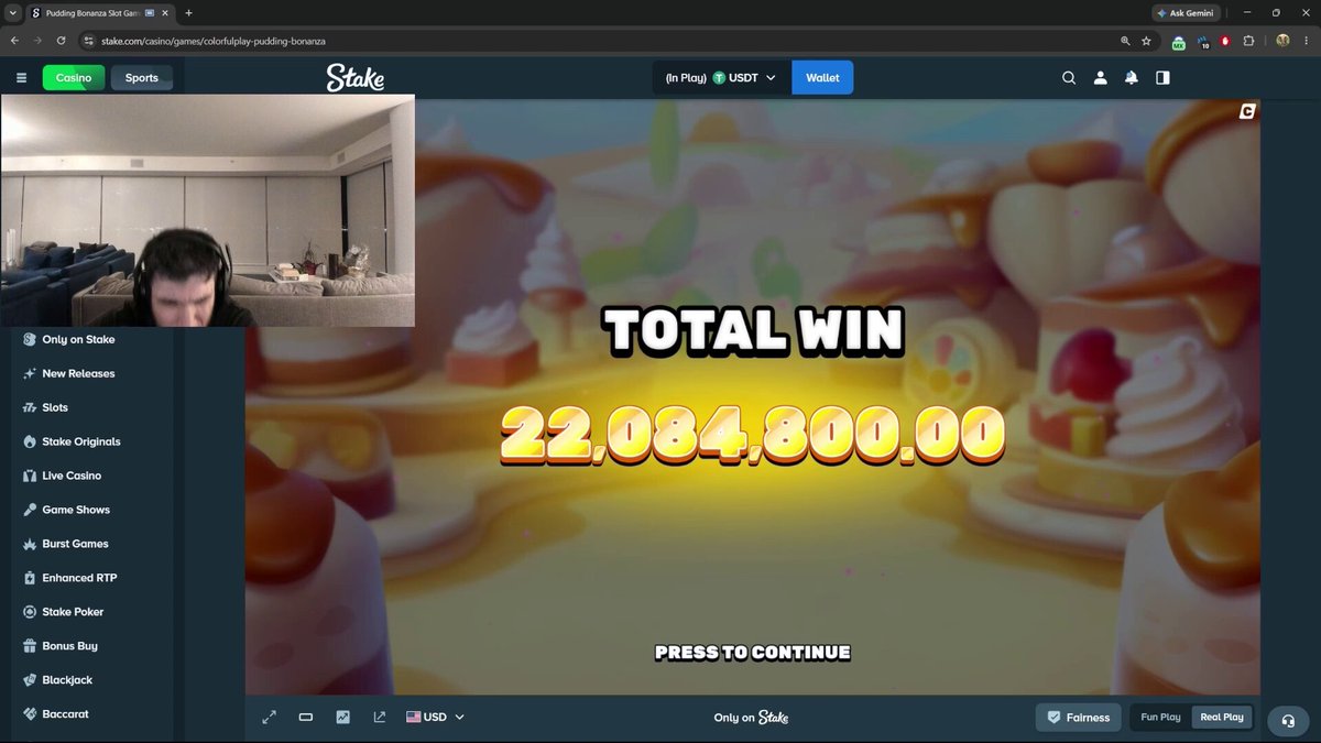 The image shows a computer screen displaying an online gaming platform with a player's win amount displayed prominently at the top of the screen. The player has won 22,098,800.00 points (€), which translates to approximately $22,098,000.00 in dollars. This amount is the maximum possible prize that can be won within this game.

The post about "@Trainwreckstv" seems to be related to a discussion or comment on the game's content, as it mentions an online gaming platform and provides a link. The image shows a person playing the game while wearing headphones for an immersive experience.