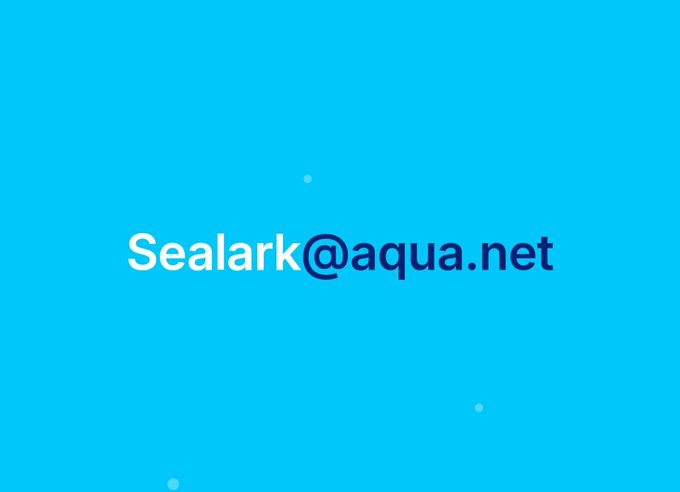 The image features a blue background with white text that reads "Sealark @ Aqua.net". The text is centered, making it easy to read and understand. The surrounding area appears to be a watercolor painting or illustration style, which adds an artistic touch to the overall presentation of the post.