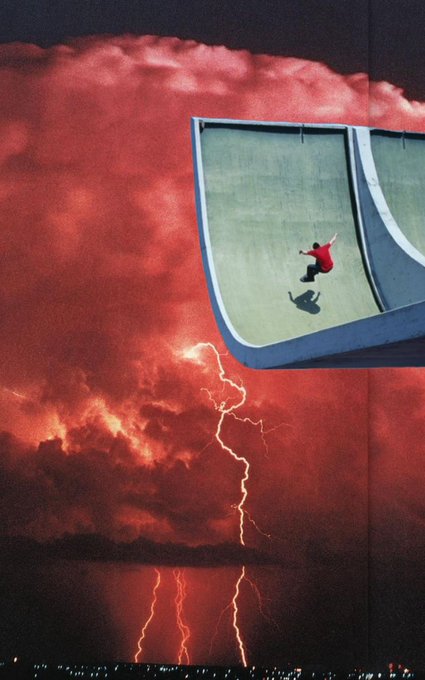 A dramatic, edited photograph showing a person in a red shirt appearing to skydive off a tall building into a vivid red sky filled with lightning bolts.
