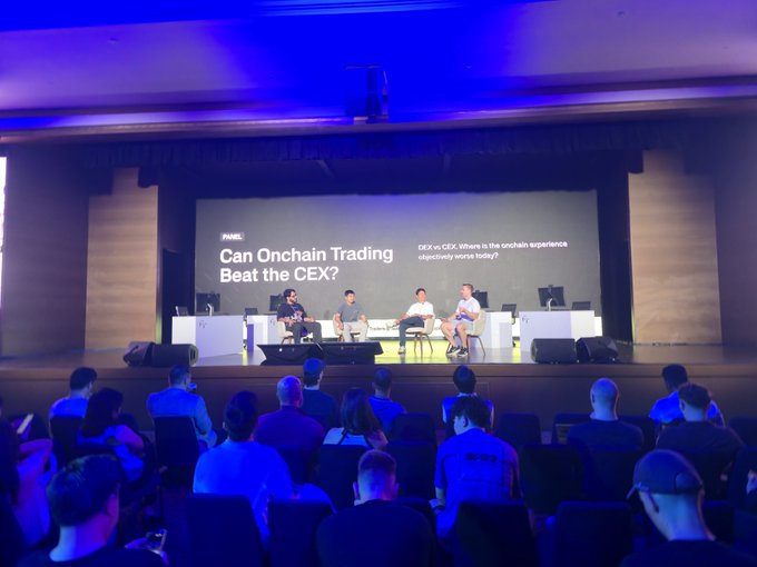 A panel discussion titled "Can Onchain Trading Beat the CEX?" at a PANEL event, with four speakers on stage and an audience watching.