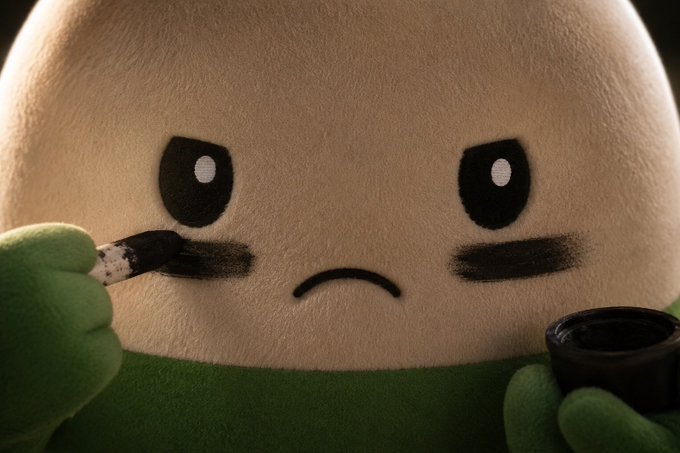 A fuzzy mascot, likely Pumpfun, applies black stripes under its eyes, symbolizing preparation for a "take over." The image effectively visualizes the aggressive and determined sentiment of the accompanying post about the $CUPSEY token.