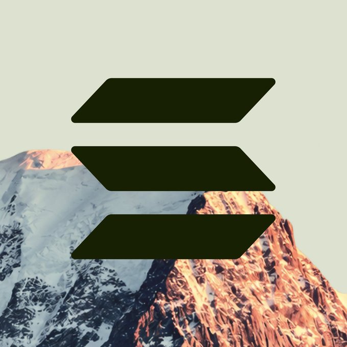A snowcapped mountain is overlaid with a large black, three-bar emblem resembling Solana’s logo. The image accompanies a Solana builders post announcing Alpenglow and highlighting fast RPC, affordable gRPC, and a $20M builder fund.