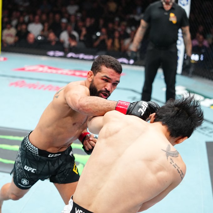 UFC fighter Patricio "Pitbull" lands a strike against Dooho Choi during their bout at UFC 331, with the event's official result confirming Pitbull's first-round knockout victory at 3:28.