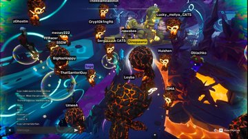 Vibrant virtual scene showing multiple avatar characters with floating name tags like 'BigAssHappy', 'CrysNighty', and 'MasterTheLegend' gathered on a brightly colored terrain.