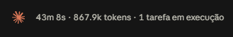 A dark status bar showing '43m 8s · 867.9k tokens · 1 tarefa em execução' with a small flower icon on the left.