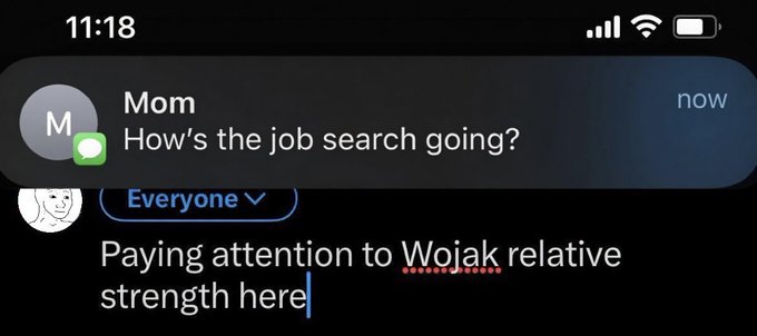 The image shows a message from someone named Wojak that reads "Sorry, Mom. We're cooking on a red day. $WOJAK". The message seems to be directed towards the mother of the person who posted the image.