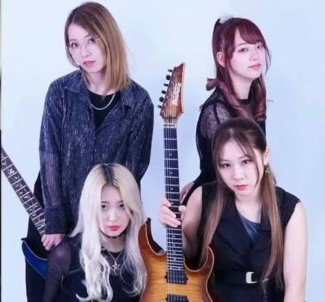 A promotional photo of a four-member Japanese rock band featuring two guitarists in black outfits posing against a light background.