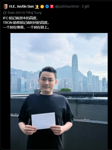 Tweet from H.E. Justin Sun (@justinsuntron) in Chinese referencing IFC capital height and TRON shipping registry, with a photo of him holding a document in front of Hong Kong skyline.