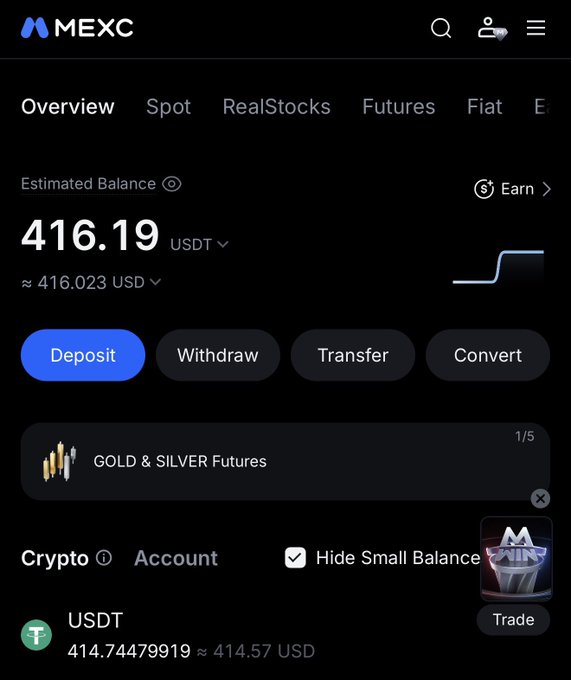 The image shows a MEXC exchange account dashboard displaying an estimated balance of 416.19 USDT (~$416.02 USD), with tabs for Overview, Spot, RealStocks, Futures, and Fiat, plus action buttons for Deposit, Withdraw, Transfer, and Convert. It visually reinforces the post's "wake up & get paid" message by showcasing earnings on the MEXC platform, highlighting the "Earn" feature and "Gold & Silver Futures" promotion as potential ways to make money through web3.
