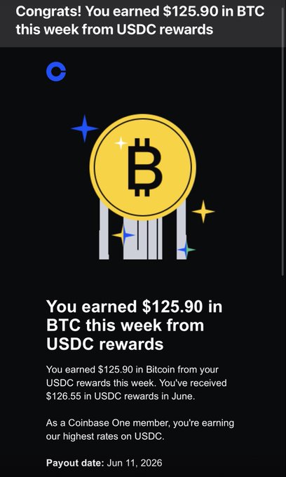 The image shows an email invitation for Bitcoin rewards with a black background against a yellow circle that features a Bitcoin symbol and text. The message states that the recipient has earned $12.9 in Bitcoin, with this payment being made from USDC rewards. The email also mentions USDC's rewards system as a way to make it easy for people to earn more money by participating in their program.