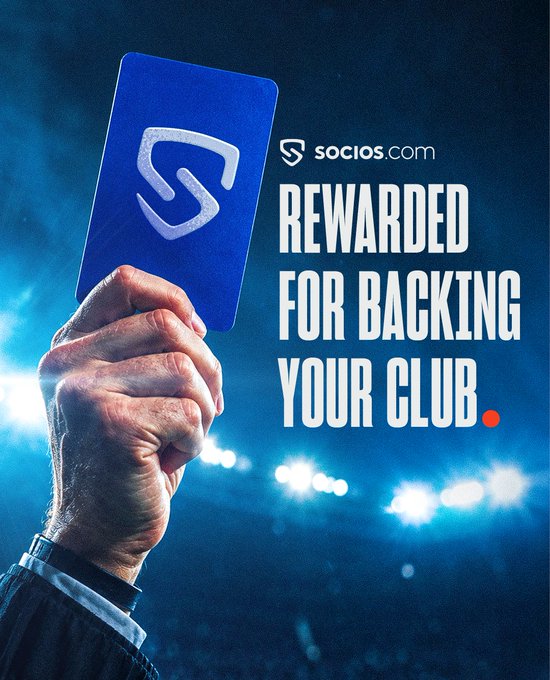 A hand holding up a blue card featuring the Socios logo against a stadium backdrop, with text reading "socios.com — REWARDED FOR BACKING YOUR CLUB." The image reinforces the post by visually showcasing a fan's loyalty card as a symbol of passionate club support being recognized and rewarded through the Socios platform.