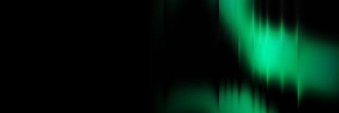 An abstract image showing a bright green glowing light effect against a black background.