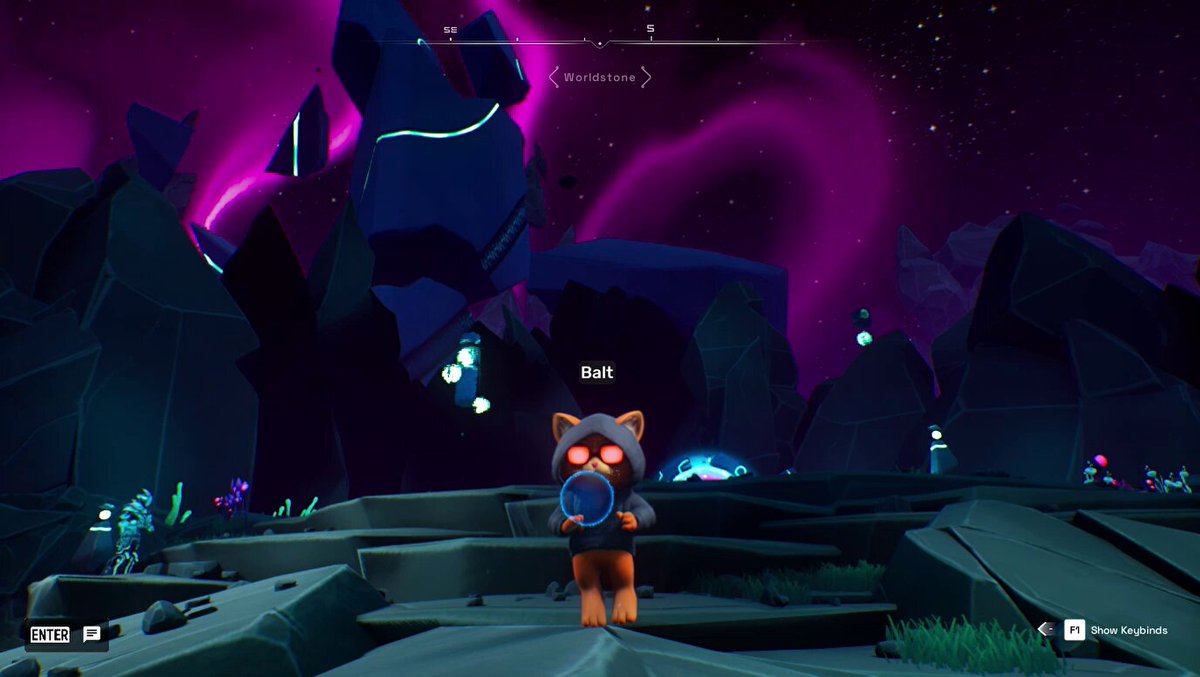 The image features a cartoon character standing next to some rocks with a purple sky behind them. The caption reads "Weekend mode officially activated. Wishing everyone a calm morning, good vibes and at least one unexpected win today. If you'r looking for something fun to do later, drop by Other Games in @OthersideMeta Everyone's welcome."