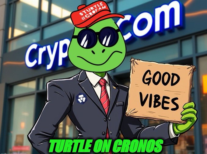 A cartoon turtle wearing sunglasses and a suit stands in front of a building labeled "Crypto.com," holding a sign that reads "Good Vibes." The turtle sports a red cap marked "$TURTLE #CROFAM," tying directly to the post's emphasis on $TURTLE and the #crofam community.
