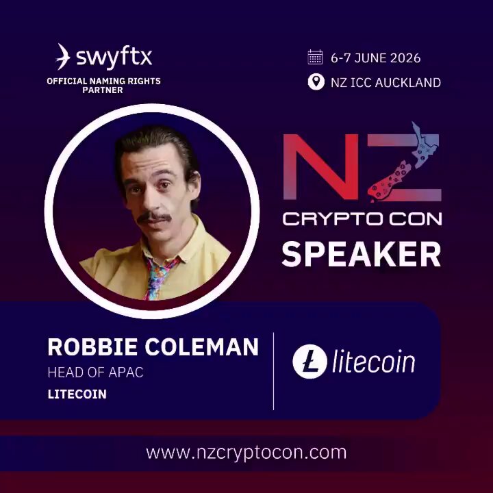 The image features an advertisement for a Crypton conference, featuring a man wearing a yellow shirt with a mustache. The text on the poster indicates that the event is taking place next weekend at the New Zealand International Convention Centre (NZICC) in Auckland, New Zealand. The poster also mentions that there are two speakers lined up to address the audience: one being @robertfcoleman and another being @nzcryptocon.com.