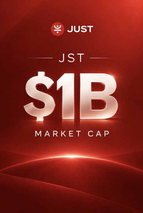 A red promotional graphic announcing JUST (JST) reaching a $1B market cap milestone.
