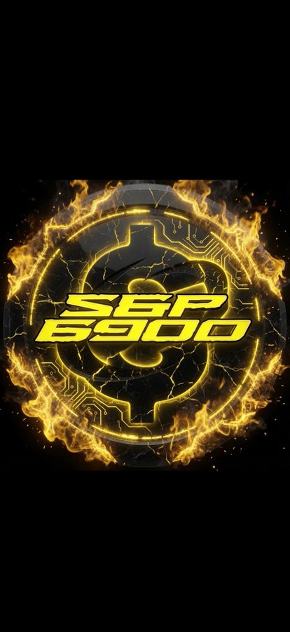 The image features a logo with a black background that has yellow flames radiating outwards from its center. The word "SSP" is prominently displayed within this fiery circle, surrounded by the flames. Below the logo, there's text that reads "Ezigbo obodo SPX690 0, Ka anyị lekwasị anya n'ịgbasa ozi ọma SPX n'ofe Nigeria mba ndị ojii kacha nwee ọnụ naịjirị". The image is set against a black background, which emphasizes the vibrant yellow flames and the text.