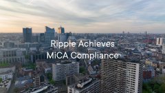 A cityscape with the text 'Ripple Achieves MiCA Compliance' overlaid on it.