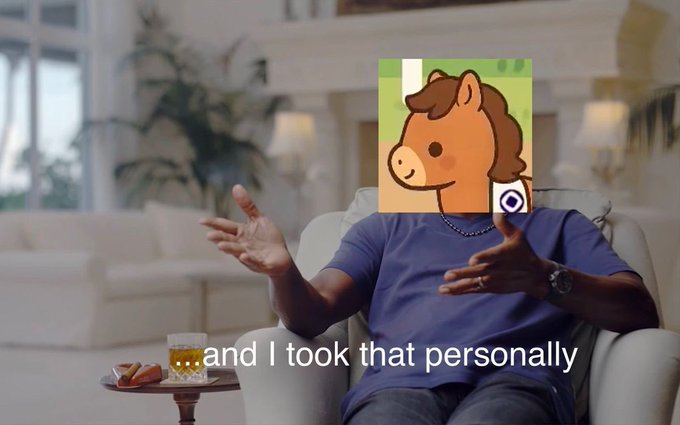 The image shows a man sitting in an armchair with his head covered by a cartoon horse's face, as if he were wearing a mask or a hat. The caption below the image reads "And I took that personally".