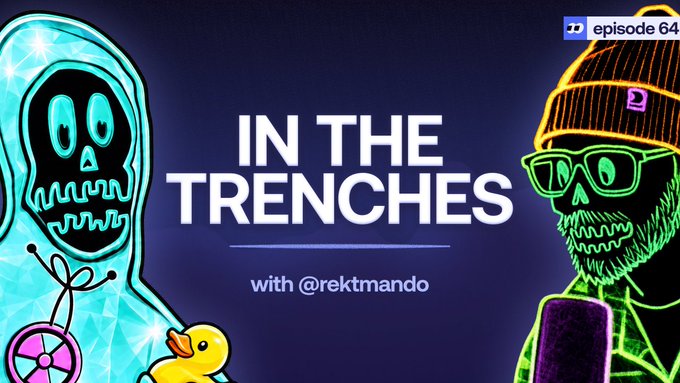 The image is a promotional graphic for "In The Trenches" episode 64, featuring neon-style illustrations of a skull in a blue hooded jacket on the left and a green skeletal figure wearing a beanie and sunglasses on the right, with the show's title centered and "@rektmando" credited as the host. The "episode 64" tag and skull imagery align with the post's announcement of a live stream at 2pm ET, suggesting a crypto/web3 talk show appearance with @fomo.