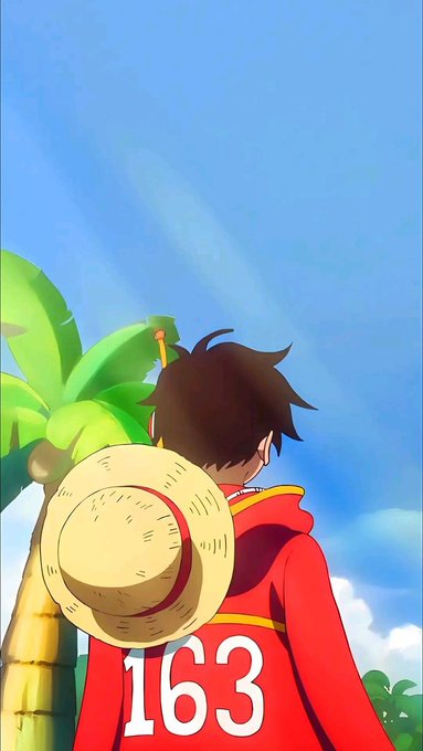 The image features a man wearing a red shirt with the number "163" on his back, holding a straw hat over his head as he walks past a palm tree. The background of the image shows a clear blue sky, suggesting that they are in an outdoor setting or near the beach. The post also mentions two different ecosystems: one being the Morning Guys and another being Season 3. This implies that there might be some sort of event or competition related to these ecosystems.