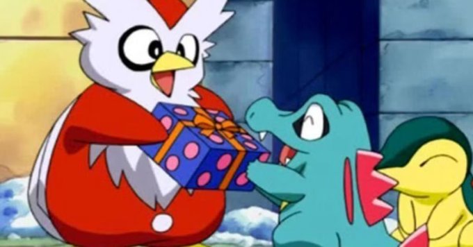 An animated scene from a Pokémon episode featuring Delibird dressed as Santa Claus handing a present to a Totodile, with a Chikorita watching nearby.