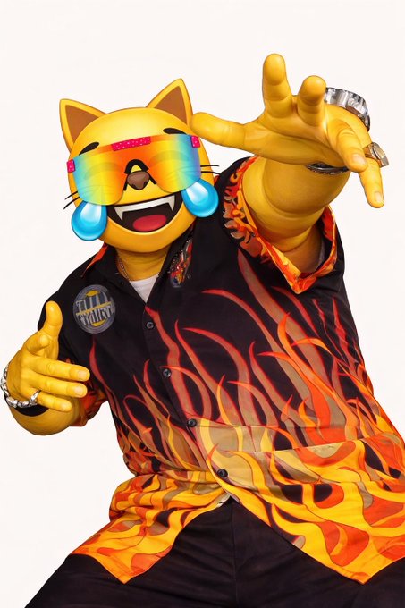 A yellow anthropomorphic cat mascot wearing rainbow visor sunglasses and a flame-patterned Hawaiian shirt poses with a peace sign, featuring a 'DIVE' patch.