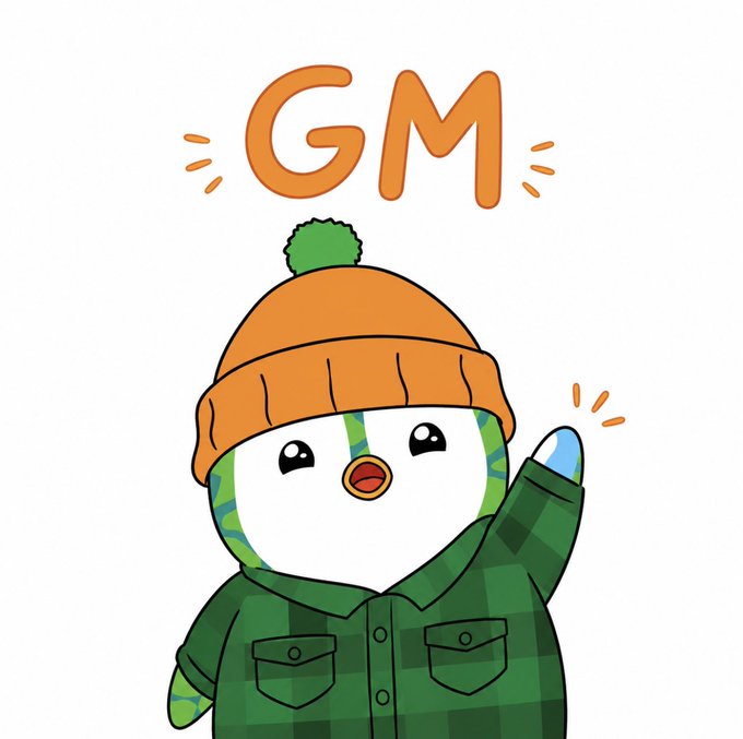 A cute cartoon bird mascot wearing a green plaid shirt and an orange beanie, waving with the text "GM" in orange letters above it.