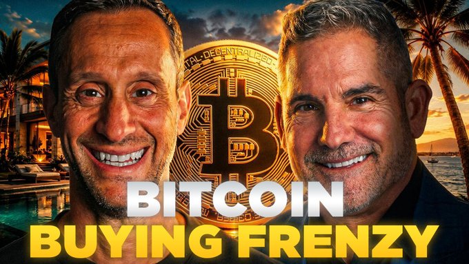 The image features two men smiling next to a large Bitcoin coin, which is the main focus of the scene. The text "I'M Buying Bitcoin Like Crazy" is written above them, indicating that they are discussing or promoting Bitcoin as an investment opportunity.