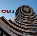 The image shows the BIS (Bank for International Settlements) logo superimposed over a distinctive curved, tiered building, likely the BIS headquarters in Basel, Switzerland. This visual ties directly to the post about the Bank for International Settlements issuing a warning against stablecoins, highlighting the institution's pushback against the growing stablecoin market.