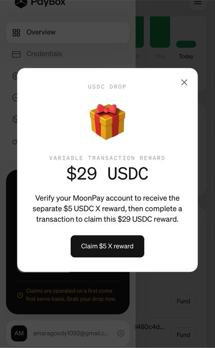 A screenshot of a PayBox app showing a "USDC DROP" popup offering a $29 USDC Variable Transaction Reward, with instructions to verify a MoonPay account and complete a transaction to claim the $5 USDC X reward.