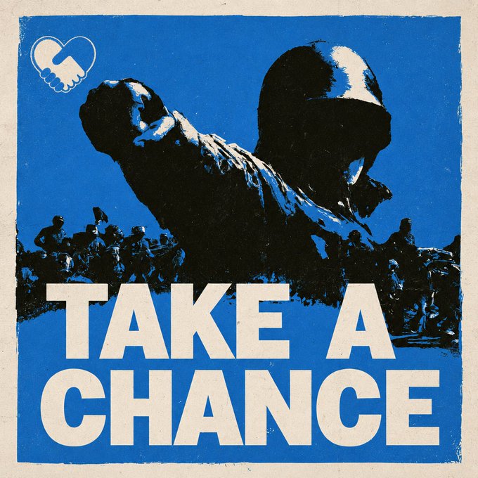 The image is a bold blue-toned poster featuring a silhouetted figure with a raised fist in the foreground and a crowd of people behind them, with the text "TAKE A CHANCE" prominently displayed at the bottom. A small handshake heart logo appears in the top-left corner, reinforcing the solidarity theme that aligns with the post's call to "take a $CHANCE" and begin a revolution.