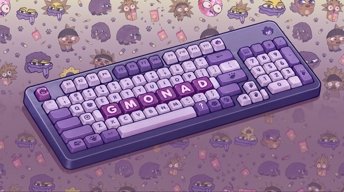 An illustrated purple and lilac mechanical keyboard spells out 'GMONAD' across its central keycaps, set against a patterned background of small cartoon characters.