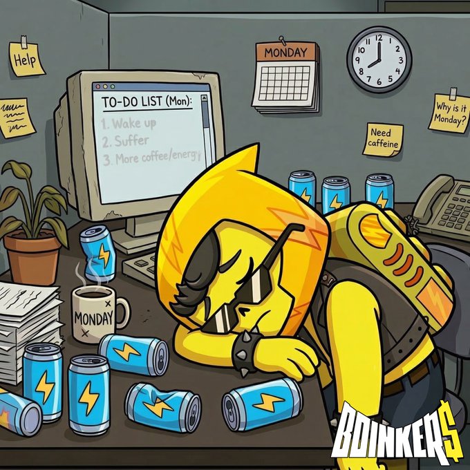 A yellow, hooded cartoon character slumps defeated at a desk buried in energy drink cans and a "MONDAY" mug, with a computer screen showing a to-do list of "1. Wake up, 2. Suffer, 3. More coffee/energy" and sticky notes reading "Help," "Why is it Monday?" and "Need caffeine." The image humorously captures the Monday exhaustion the post references, promoting Boinkers' "Monday survival kit" of coffee and free spins at l.boinkers.io.