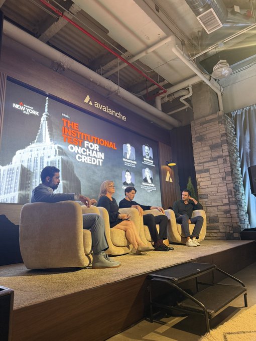 Panel discussion at an Avalanche event in New York titled 'The Institutional Test for Onchain Credit' with multiple speakers seated on stage.