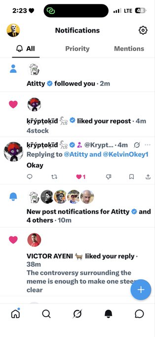 A mobile screenshot of notifications showing Atitty and Kryptokid following/liking the user's post, with VICTOR AYENI also liking a reply discussing a controversy regarding a meme.